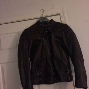 Woman’s riding leather jacket.